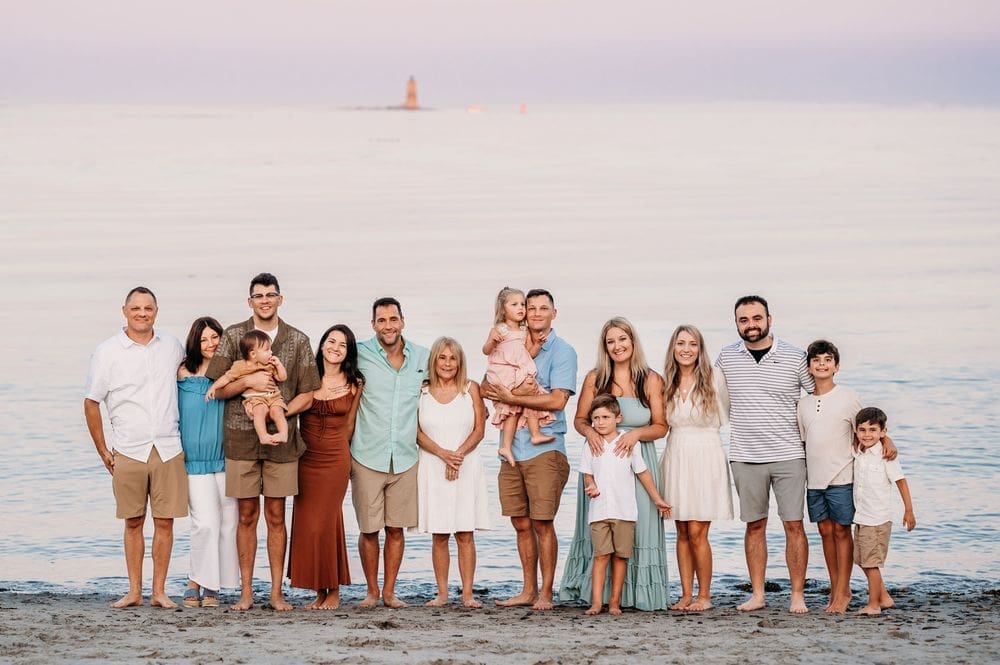 Extended family at photo session in Newcastle Common beach
