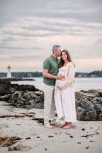Expectant couple at Newcastle Commons beach during their maternity session.