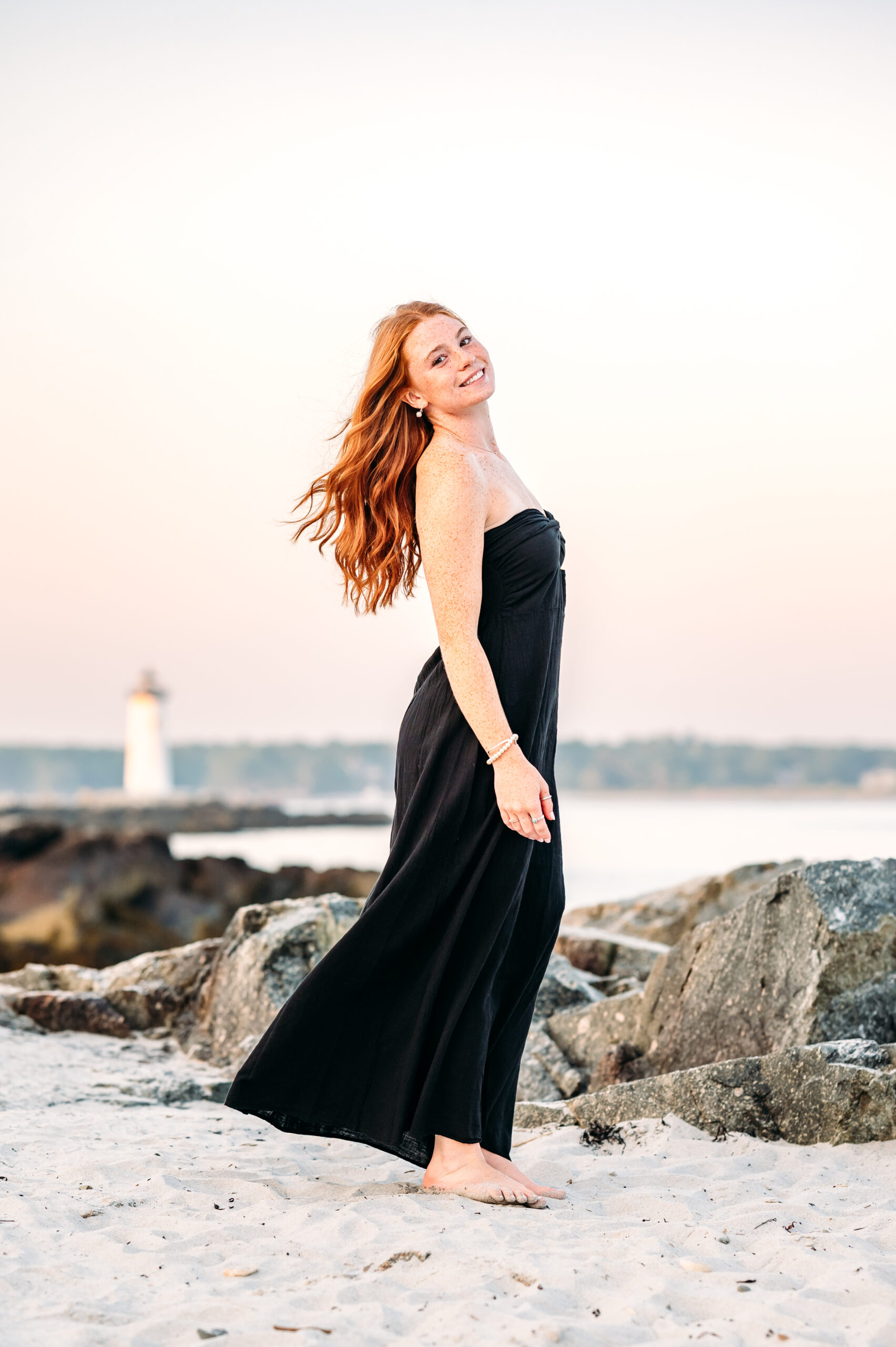 Winnacunnet High School Senior at beach senior session in New Castle, NH.