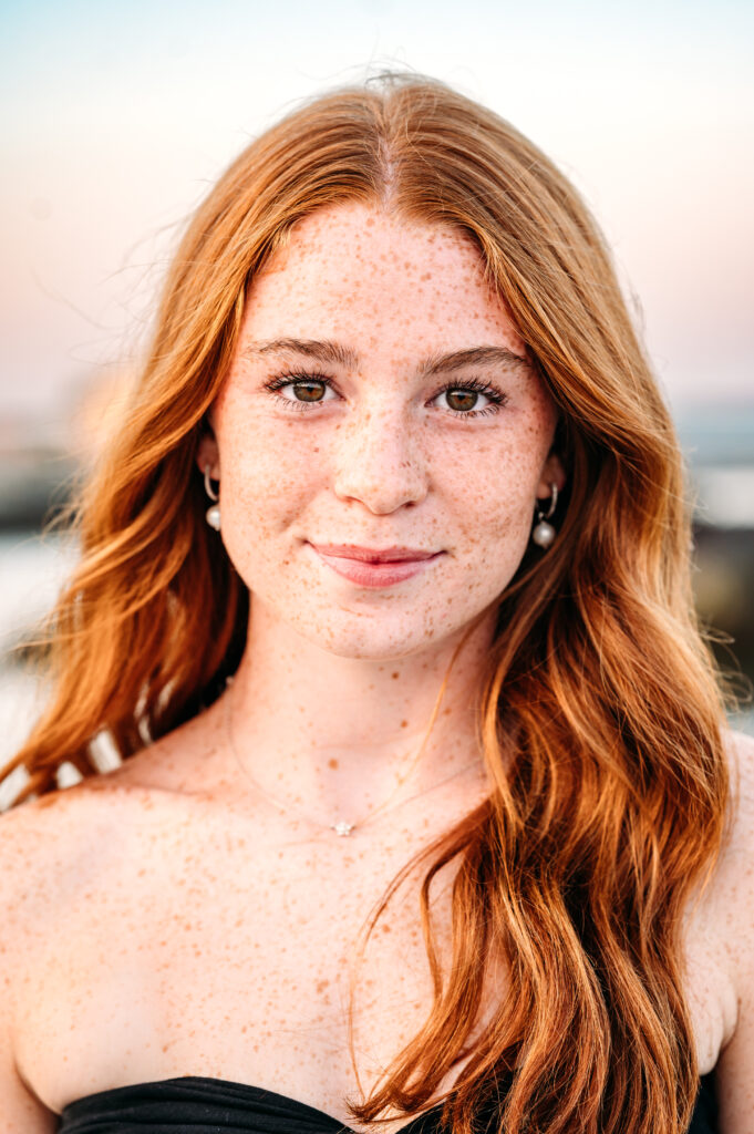 Winnacunnet High School Senior at beach senior session in New Castle, NH.