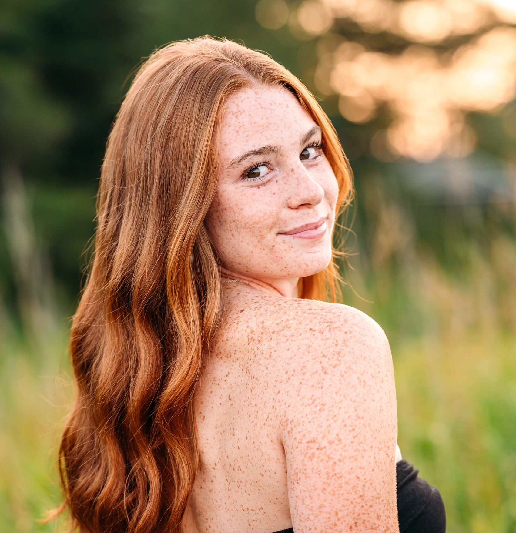 Winnacunnet High School Senior at beach senior session in New Castle, NH.