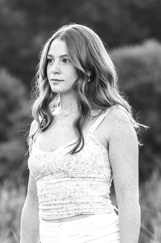 Winnacunnet High School Senior at beach senior session in New Castle, NH.